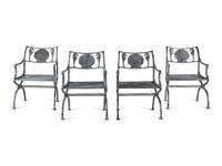 Four Wrought Iron Armchairs