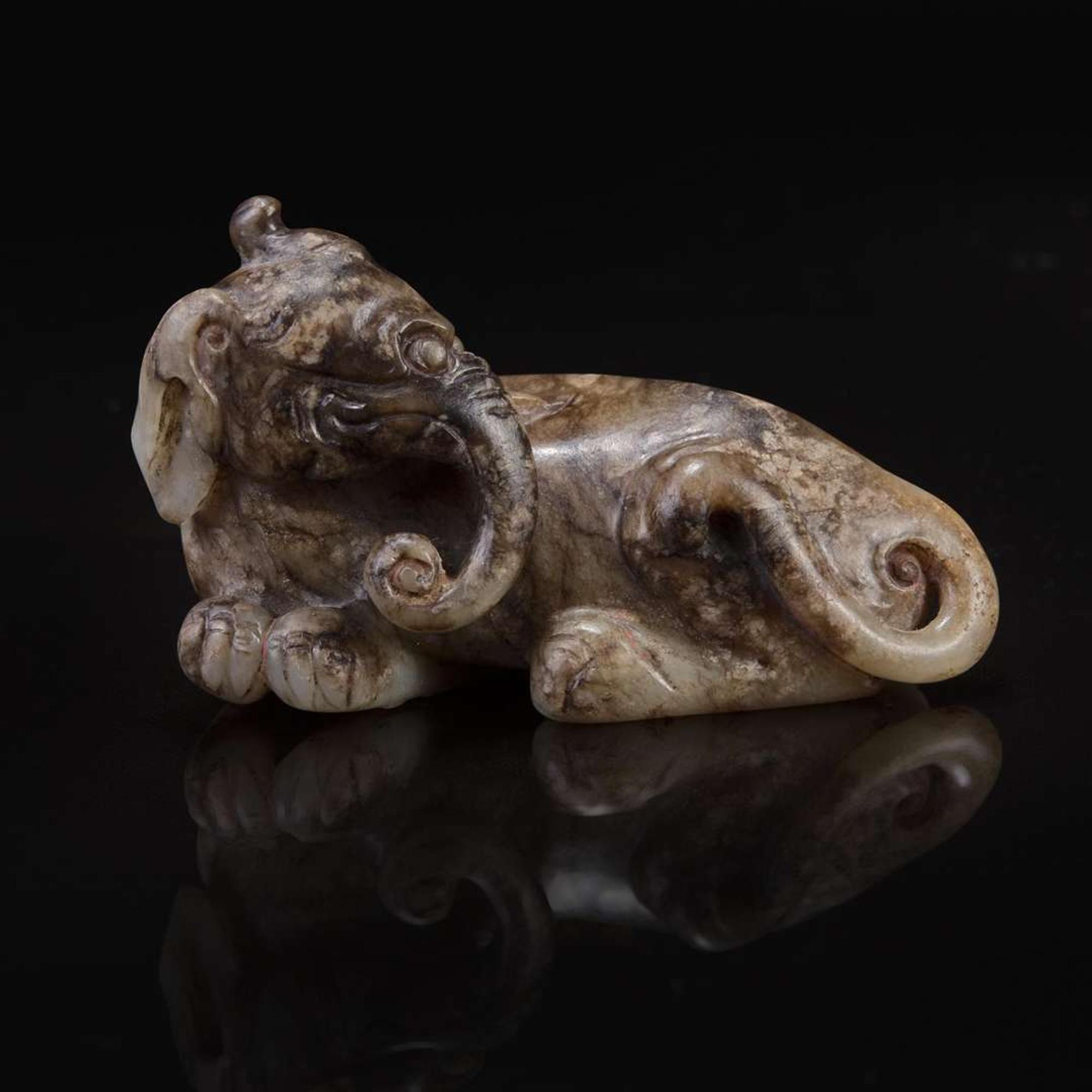 A Chinese brown and beige jade carving of a Baku 玉雕貘 Ming dynasty or earlier ????