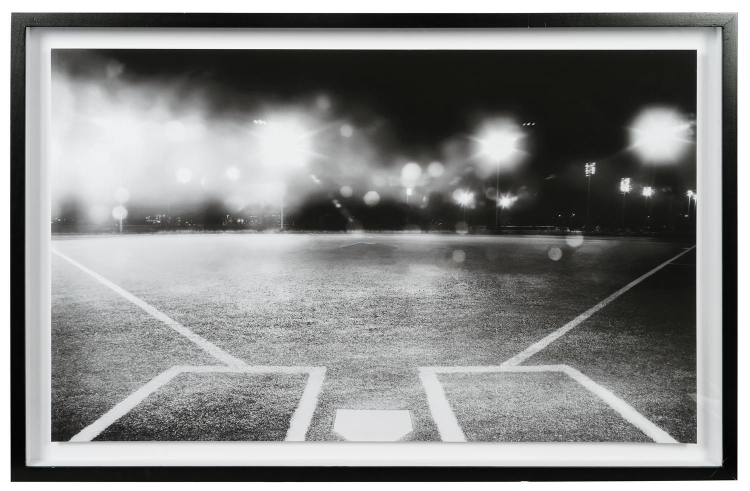 A Group of Four Framed Photographs