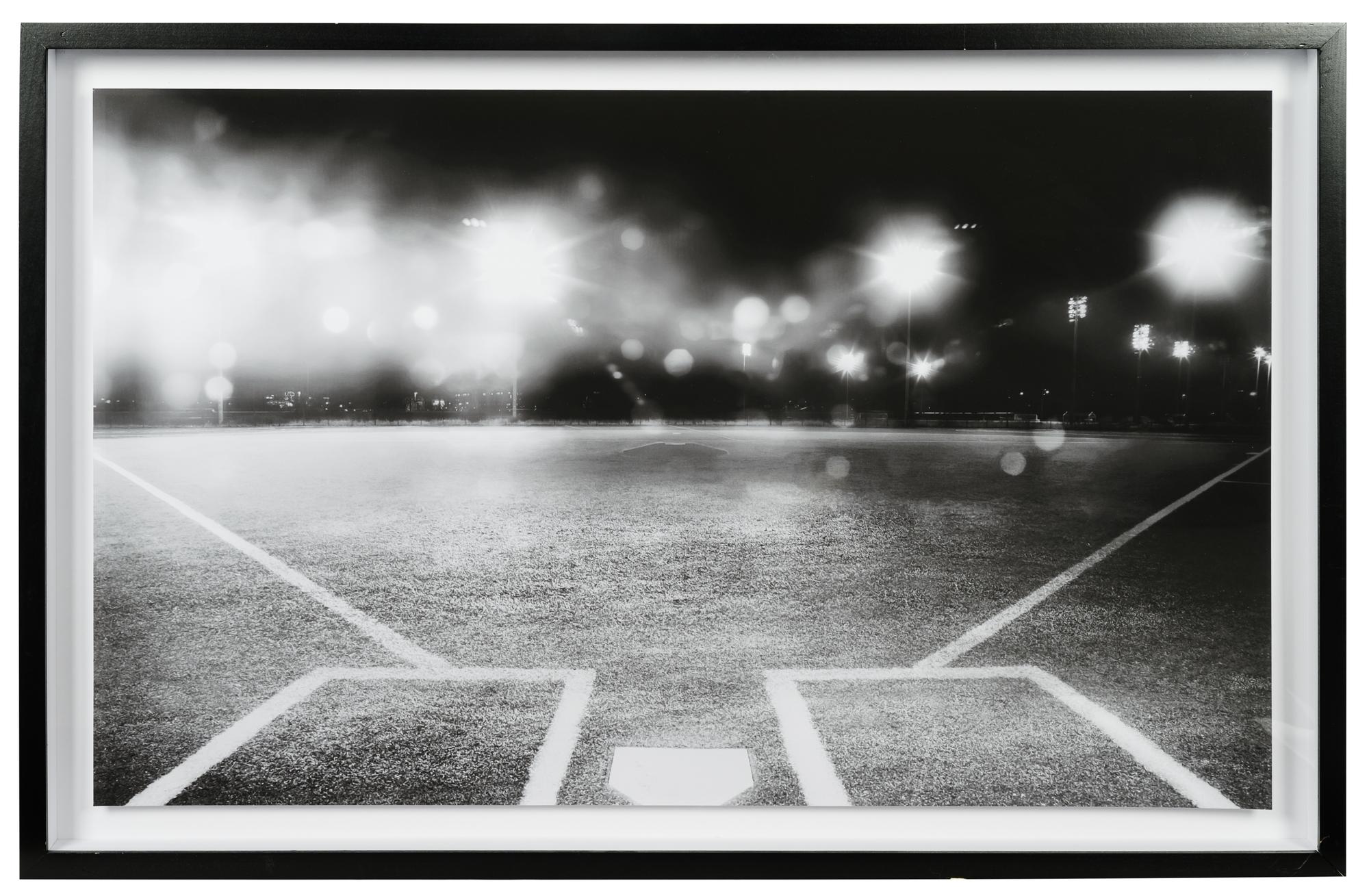 A Group of Four Framed Photographs