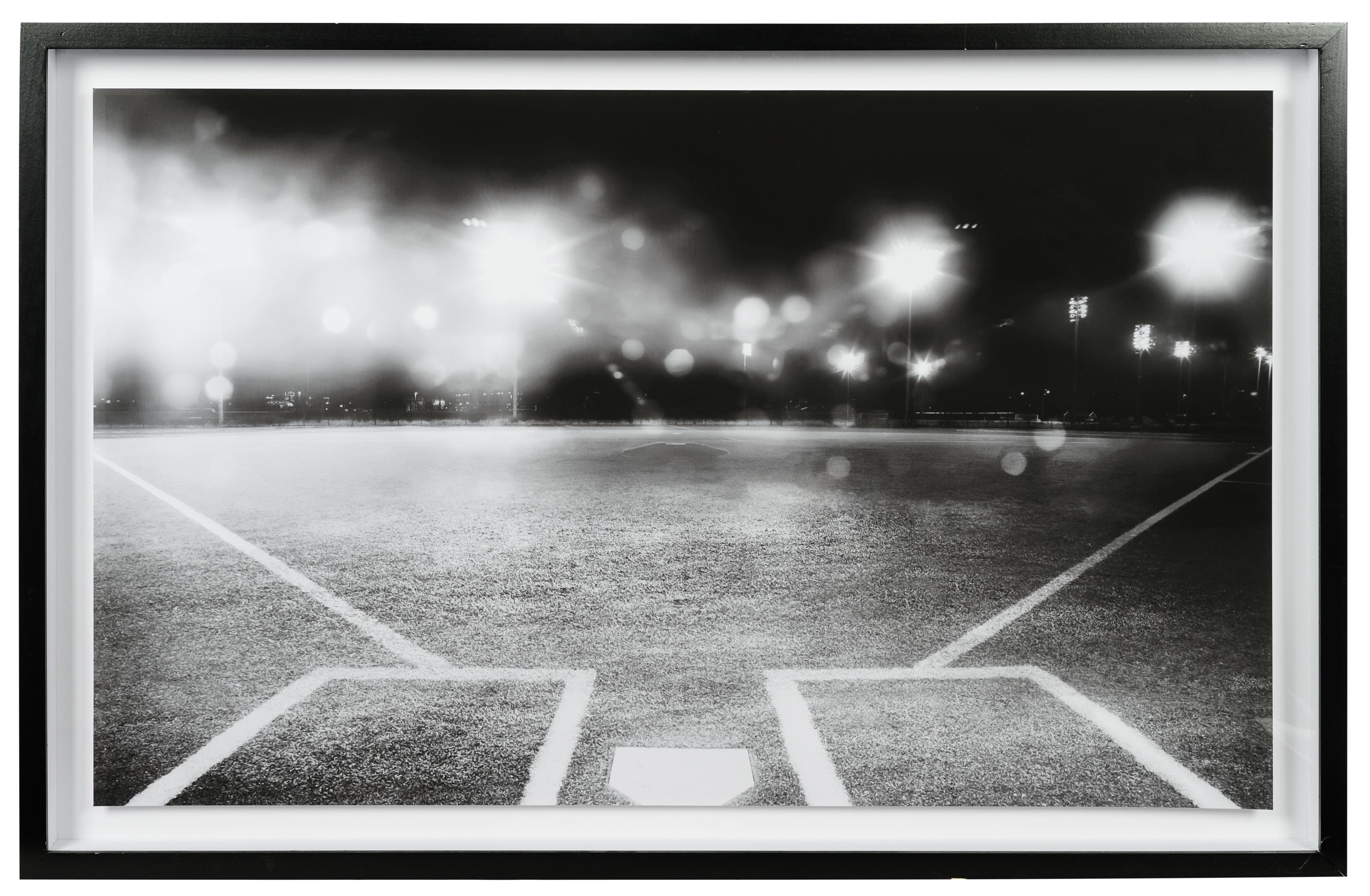 A Group of Four Framed Photographs