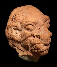A Roman Terracotta Grotesque Head