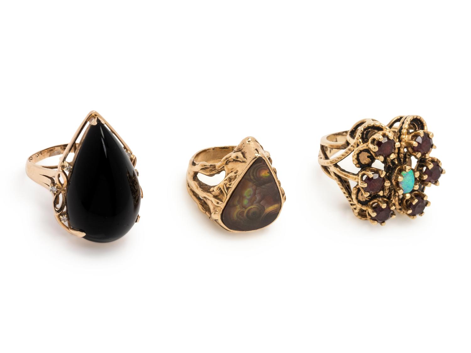 COLLECTION OF YELLOW GOLD AND GEMSTONE RINGS