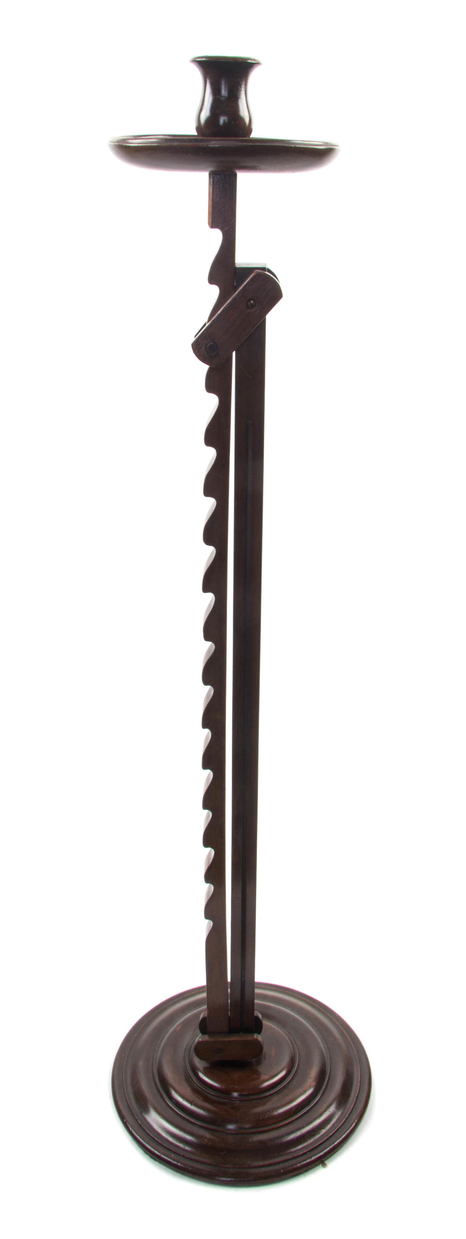 A Georgian Mahogany Adjustable Candlestick, Height 35 inches (fully collapsed).