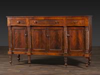 An American Empire Carved and Highly Figured Mahogany and Cherrywood Sideboard