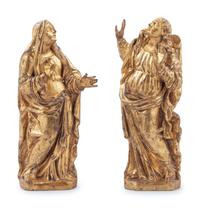 A Pair of Continental Giltwood Relief Carved Figures