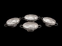 A Set of Four Silverplated Two-Handled Oval Bowls