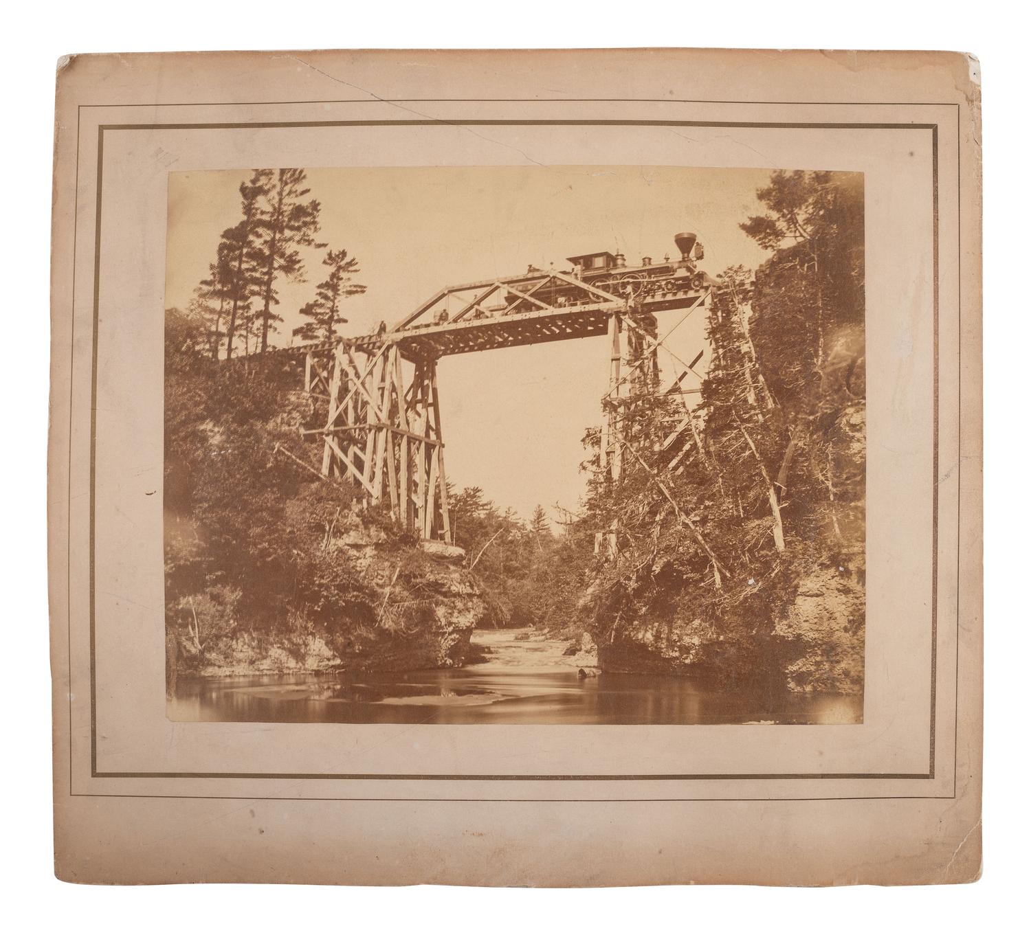 [TRANSPORTATION]. 4 photographs, incl. railroad and steamship views.