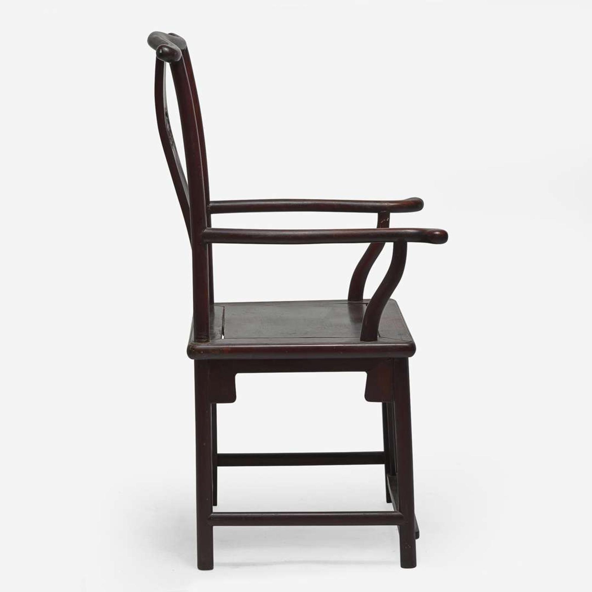 A Chinese hardwood armchair, possibly hongmu, Sichutou Guanmaoyi 硬木四出头官帽椅 或红木 Qing dynasty ?