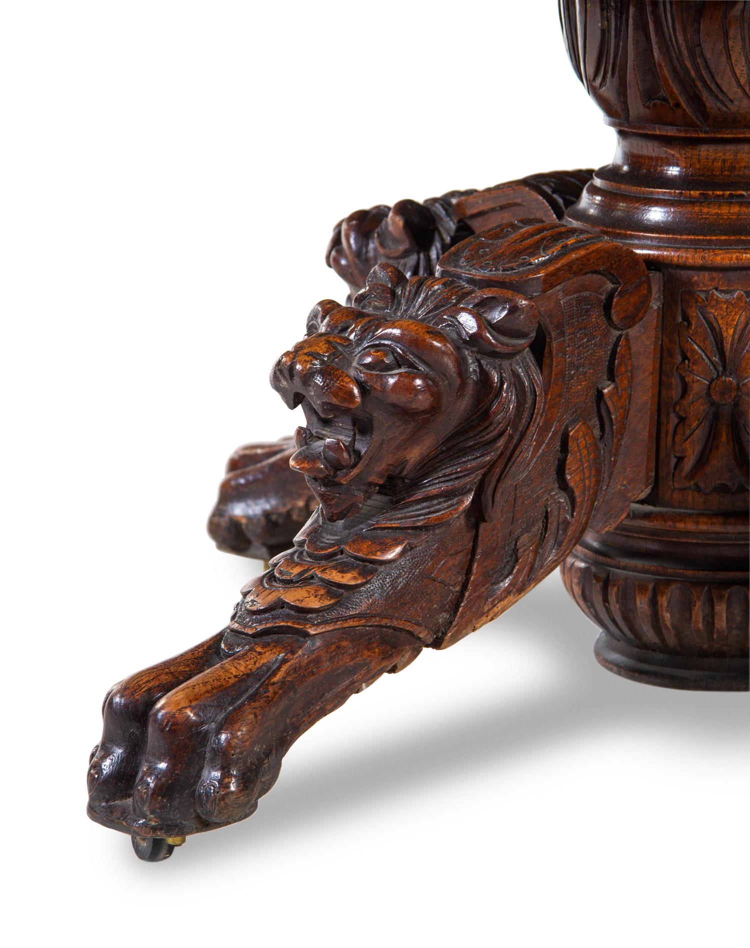 A Renaissance Revival Carved Walnut Table