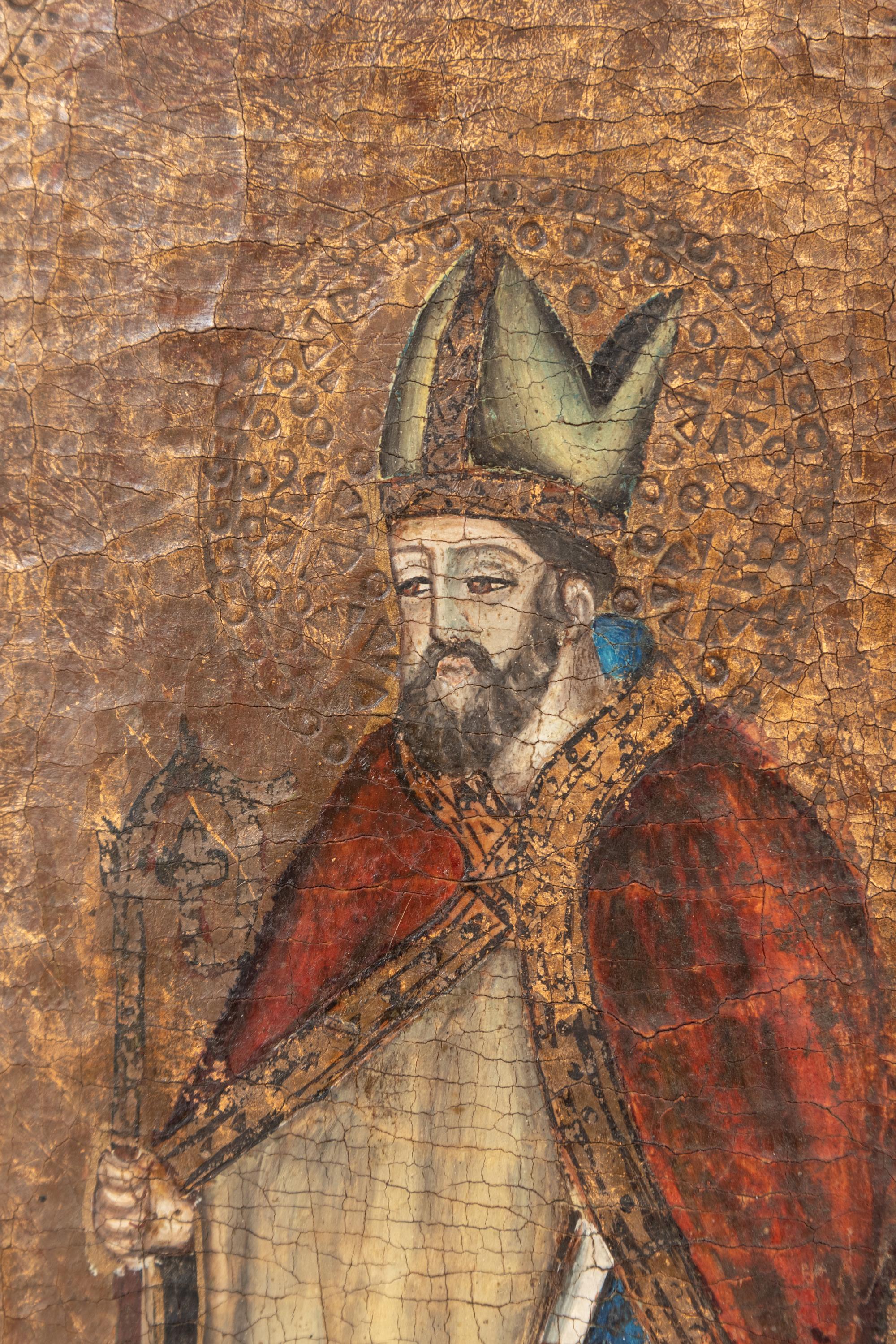 A Continental Painted and Parcel Gilt Triptych