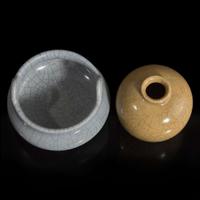 A Chinese guan-style tripod censer and a small jar 官窑三足香炉及小罐