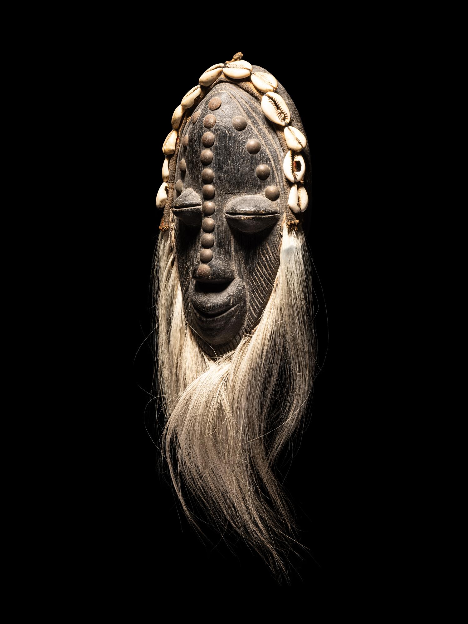 A Dan Wood Mask with a Baboon Fur Beard