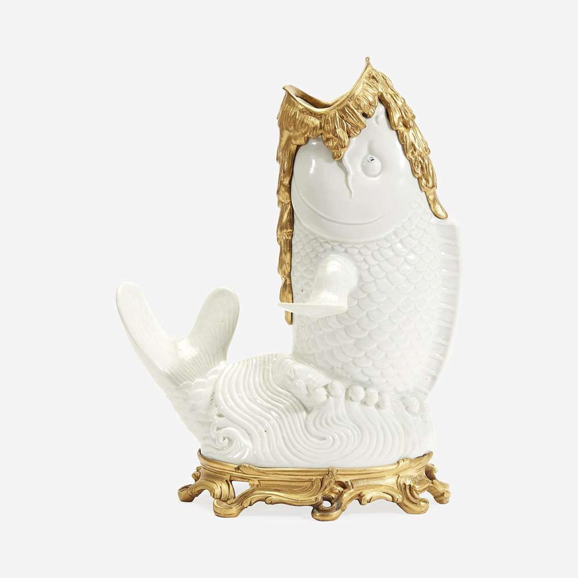 A Japanese Gilt Bronze-Mounted White-Glazed Koi-Form Vase The porcelain possibly Hirado