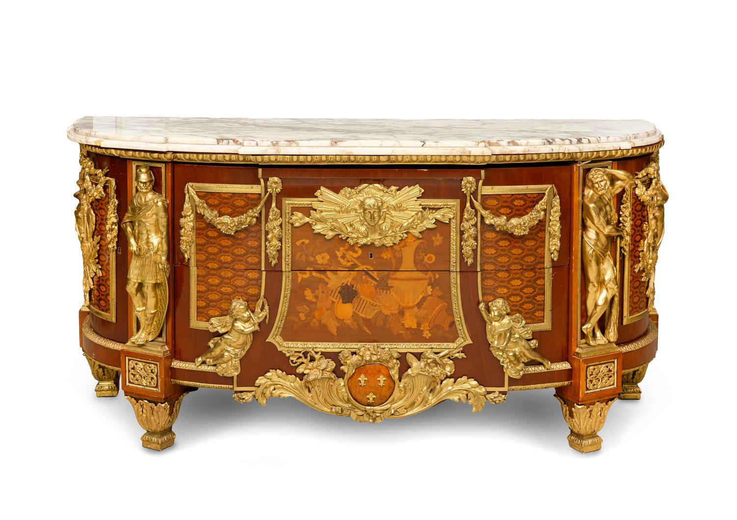A Louis XVI Style Gilt Bronze Mounted Marquetry Commode