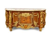 A Louis XVI Style Gilt Bronze Mounted Marquetry Commode