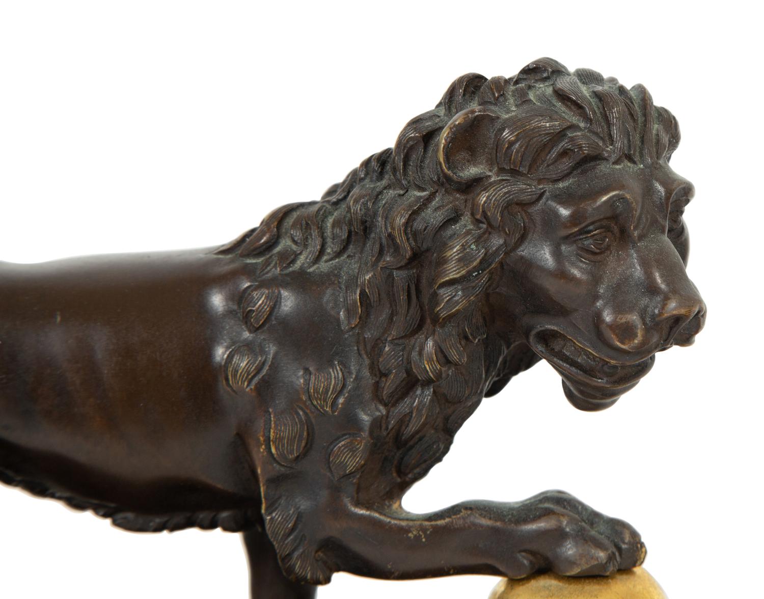 A Pair of Continental Patinated and Gilt Bronze Medici Lions