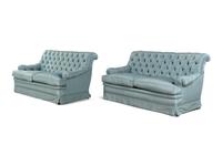 A Pair of Custom French Silk-Upholstered Button Tufted Sofas