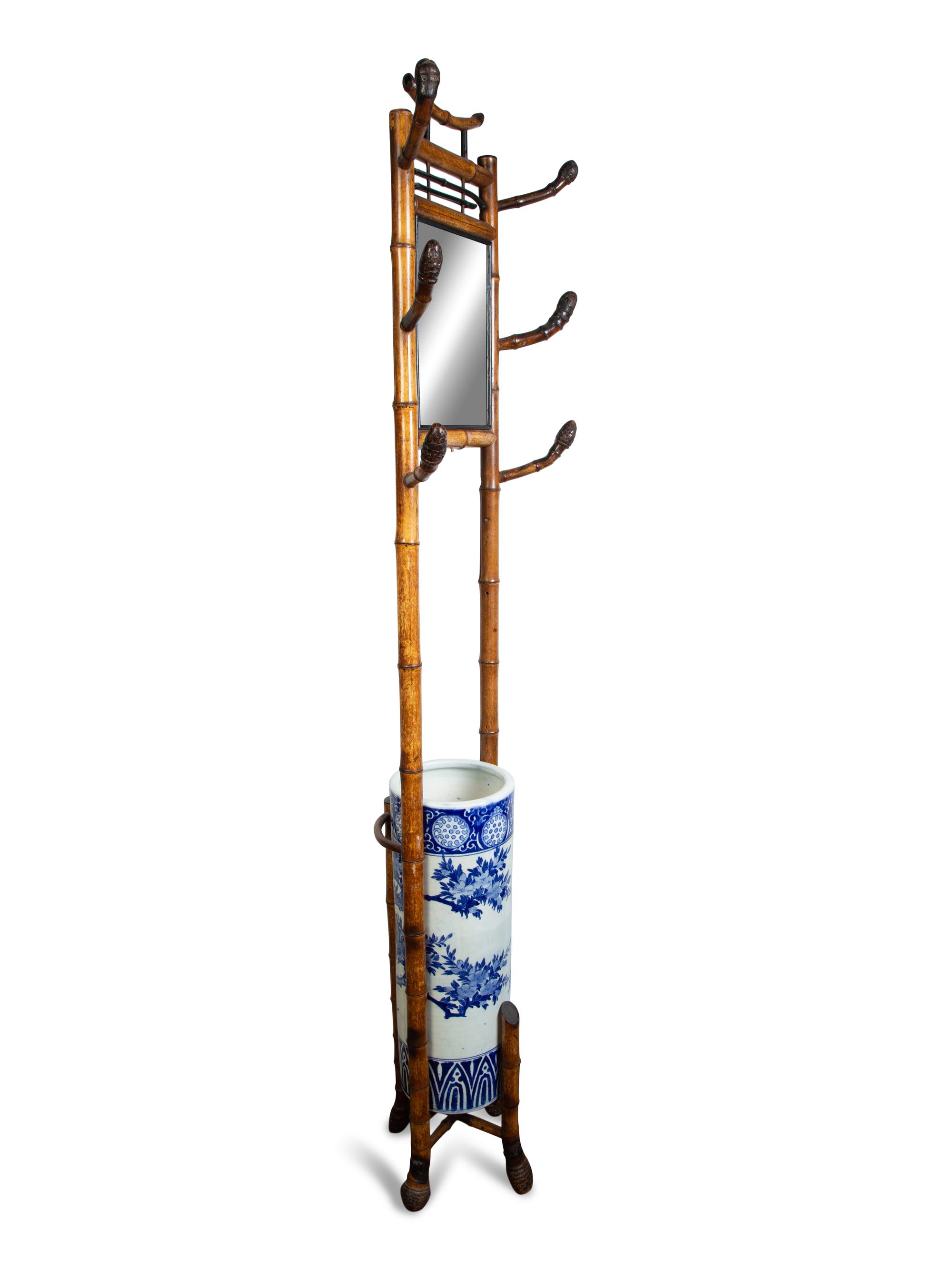 A Chinese Bamboo Hall Stand Fitted with a Blue and White Porcelain Umbrella Jar — 19TH/20TH CENTURY