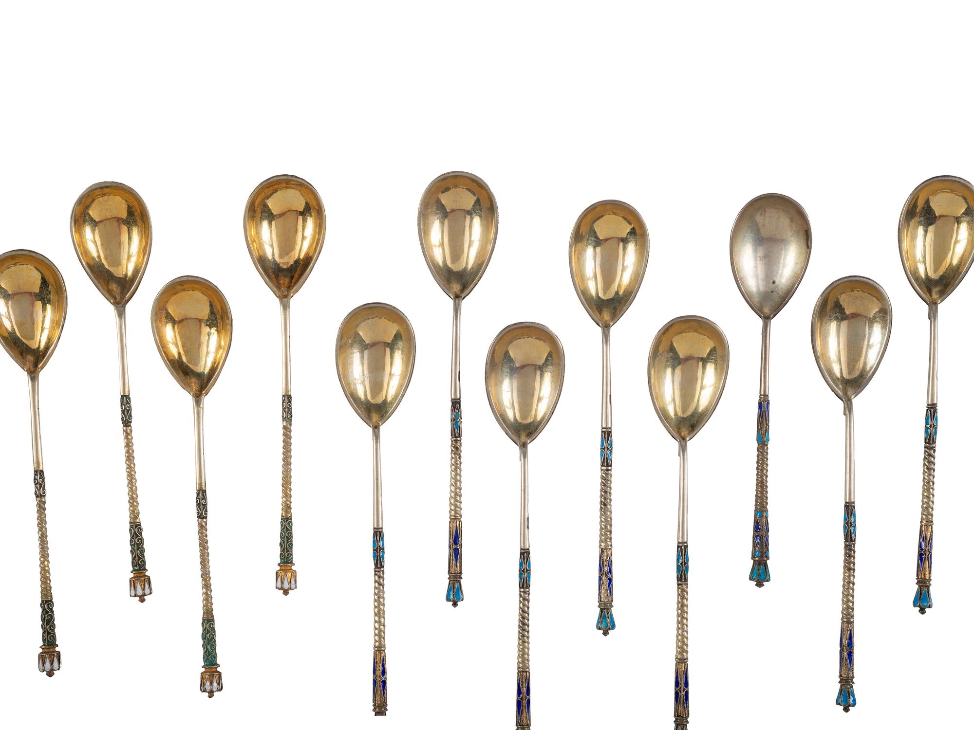 Thirty Russian Silver and Enamel Spoons and Forks
