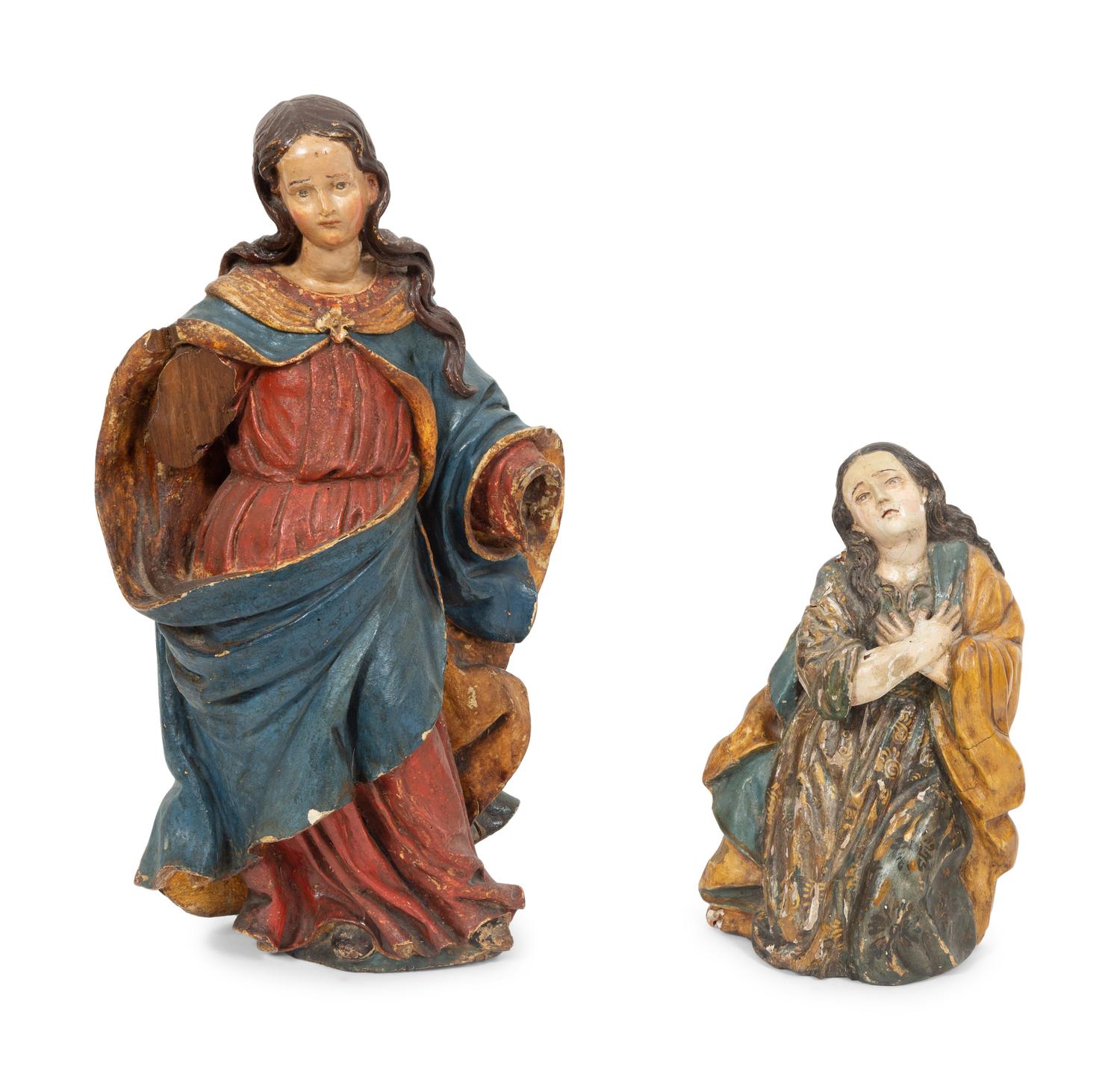 Two Italian Polychromed and Gilt Santos Figures