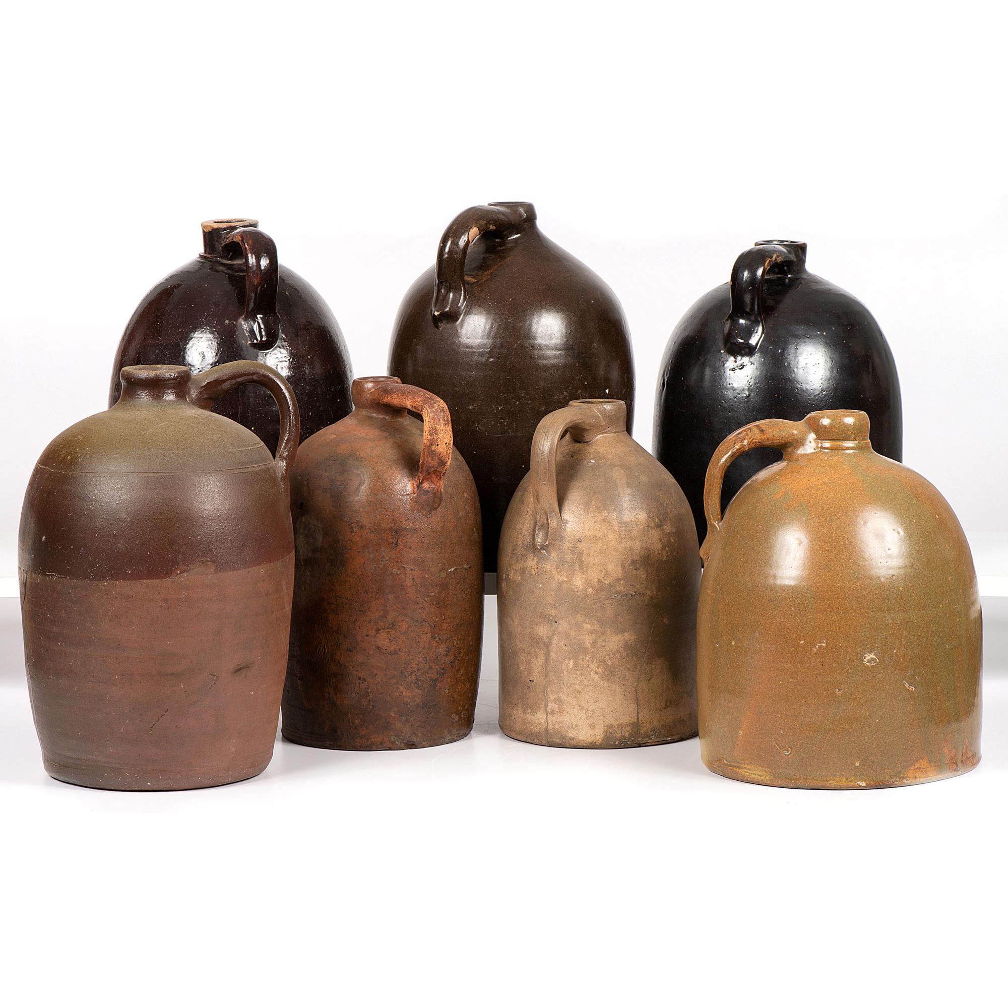 Seven Stoneware Jugs