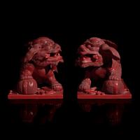 A Pair of Chinese Cinnabar Lacquer 'Lions' Boxes, 20th Century 剔紅佛獅形蓋盒一對