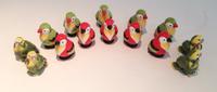 A Collection of Seven Pairs of Parrot-Form Salt and Pepper Shakers