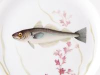 A Set of Twelve Royal Copenhagen Parcel Gilt Porcelain Fish Plates