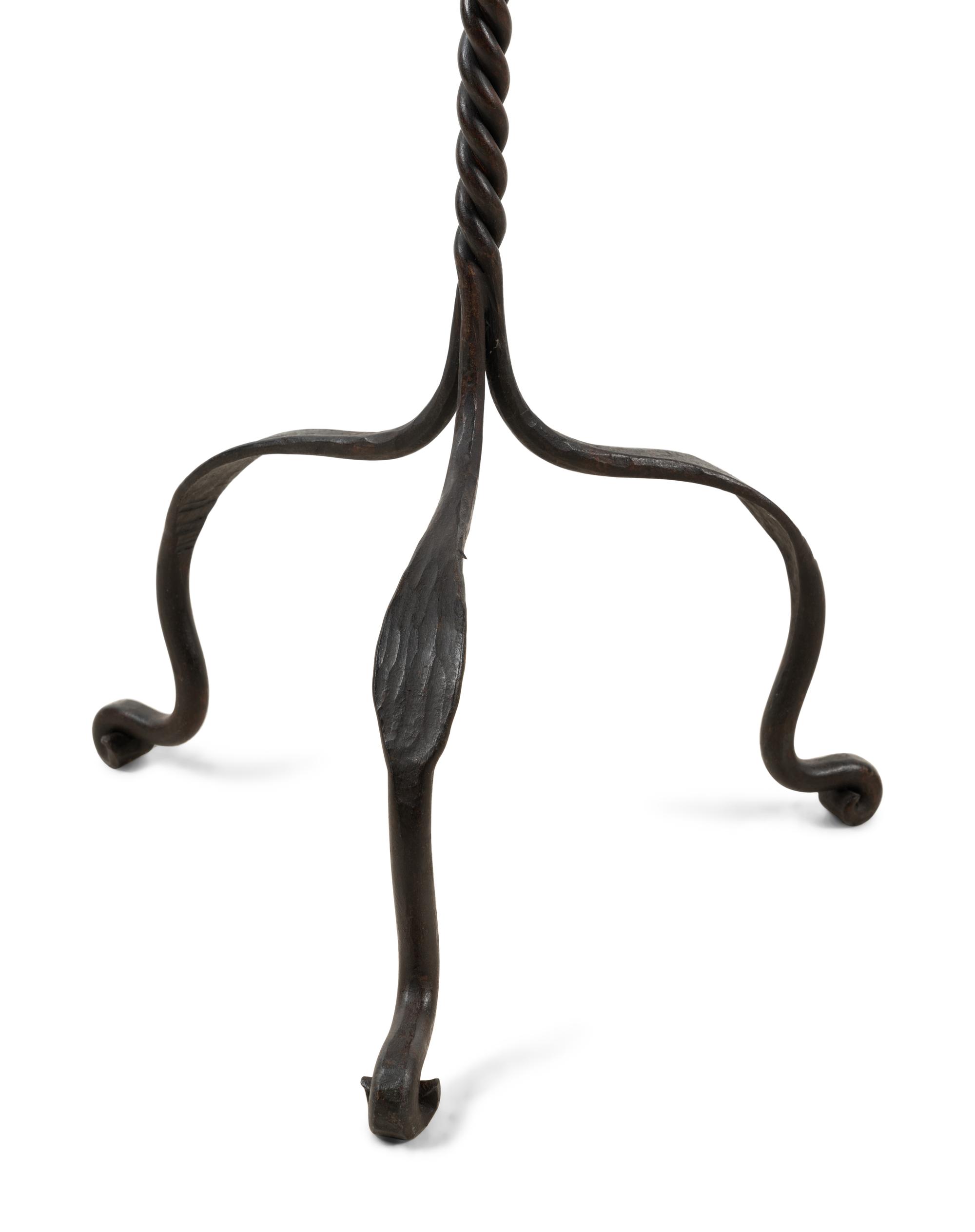 A Pair of Wrought Iron Floor Lamps