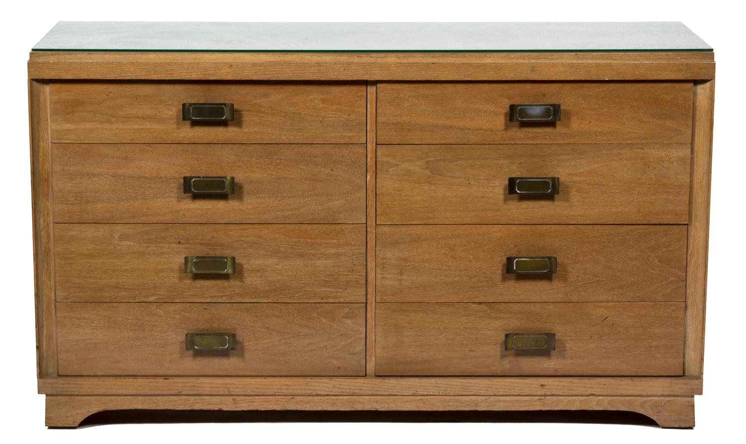 An American Modern Eight Drawer Low Chest Height 33 1/2 x width 57 3/4 x depth 20 inches. — 20TH CENTURY