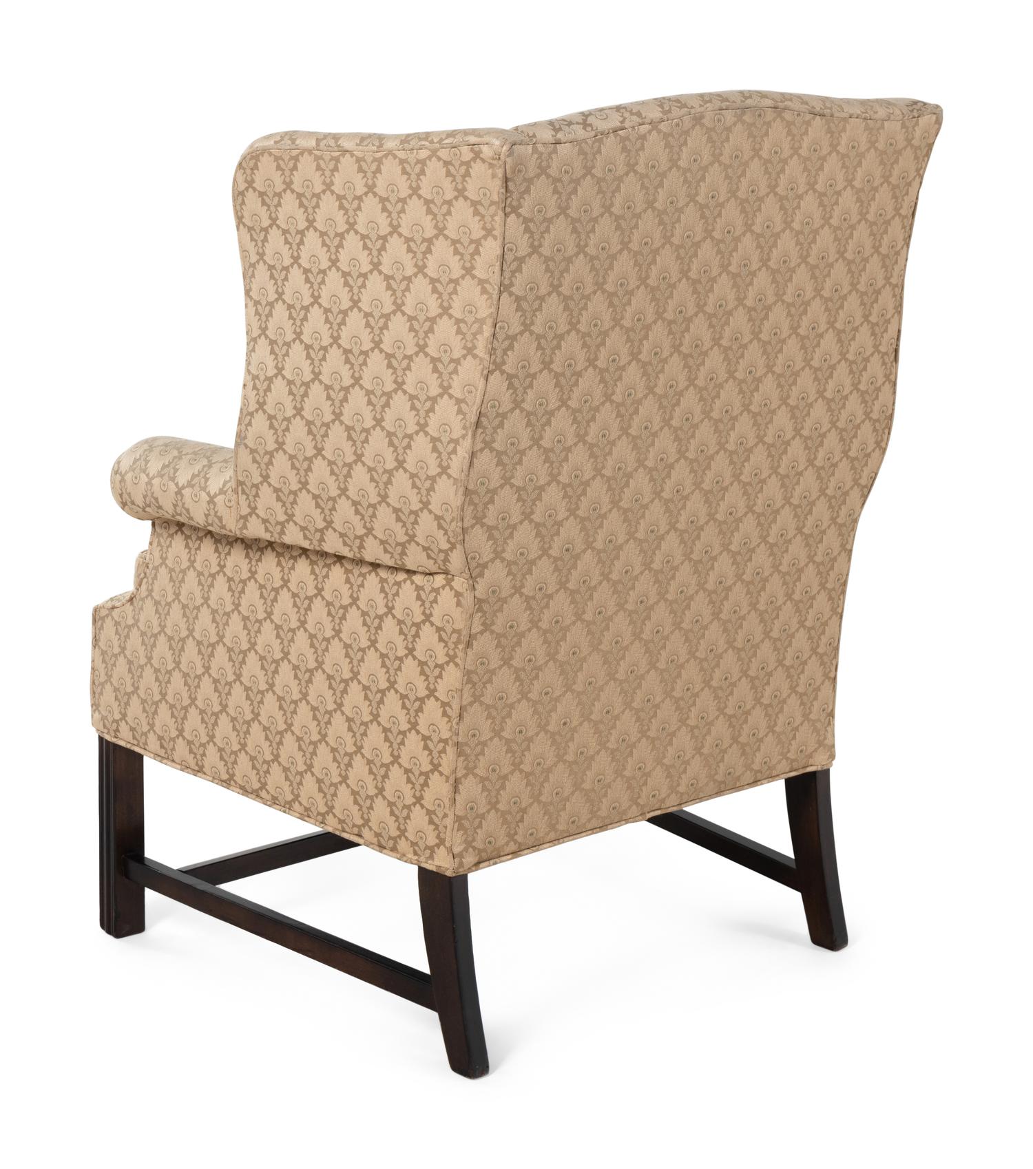 A Pair of George III Style Wingback Armchairs