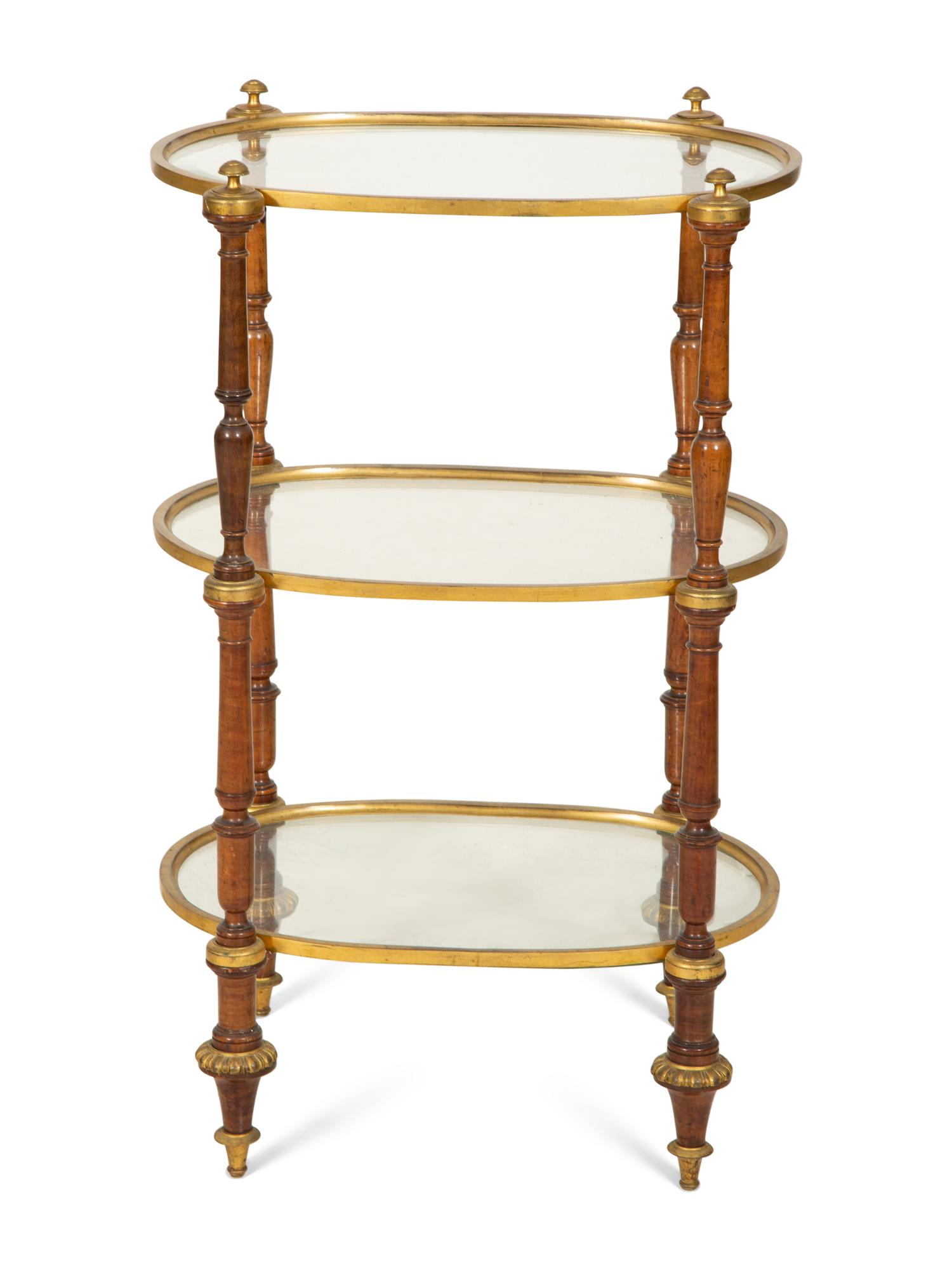An English Gilt Brass, Walnut and Glass Etagere