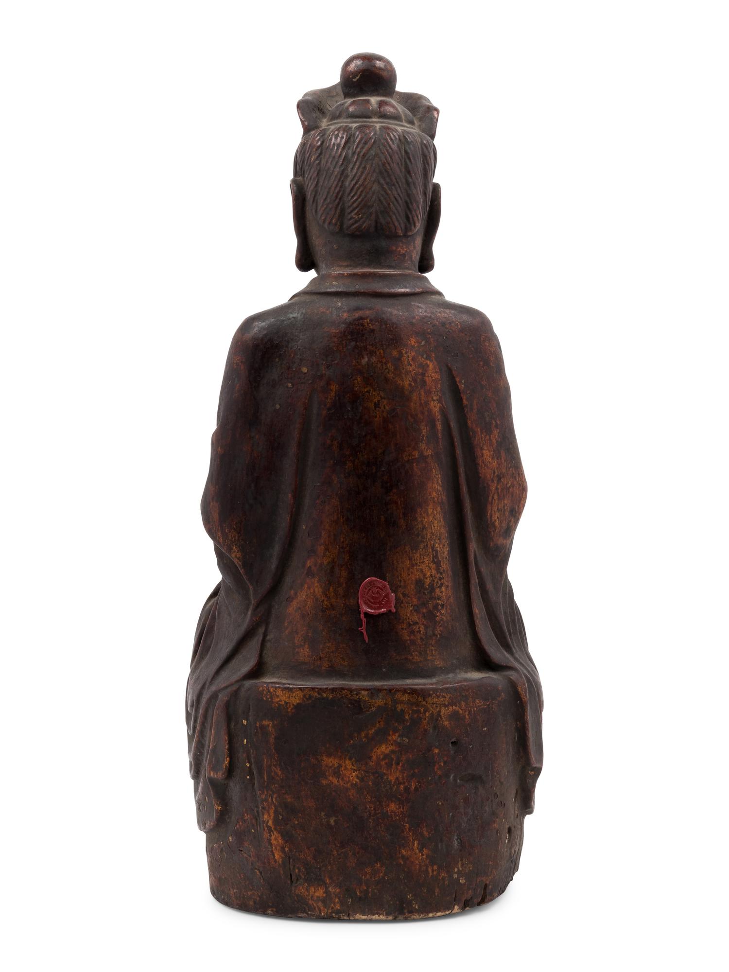 A Chinese Carved Wood Seated Buddha Figure