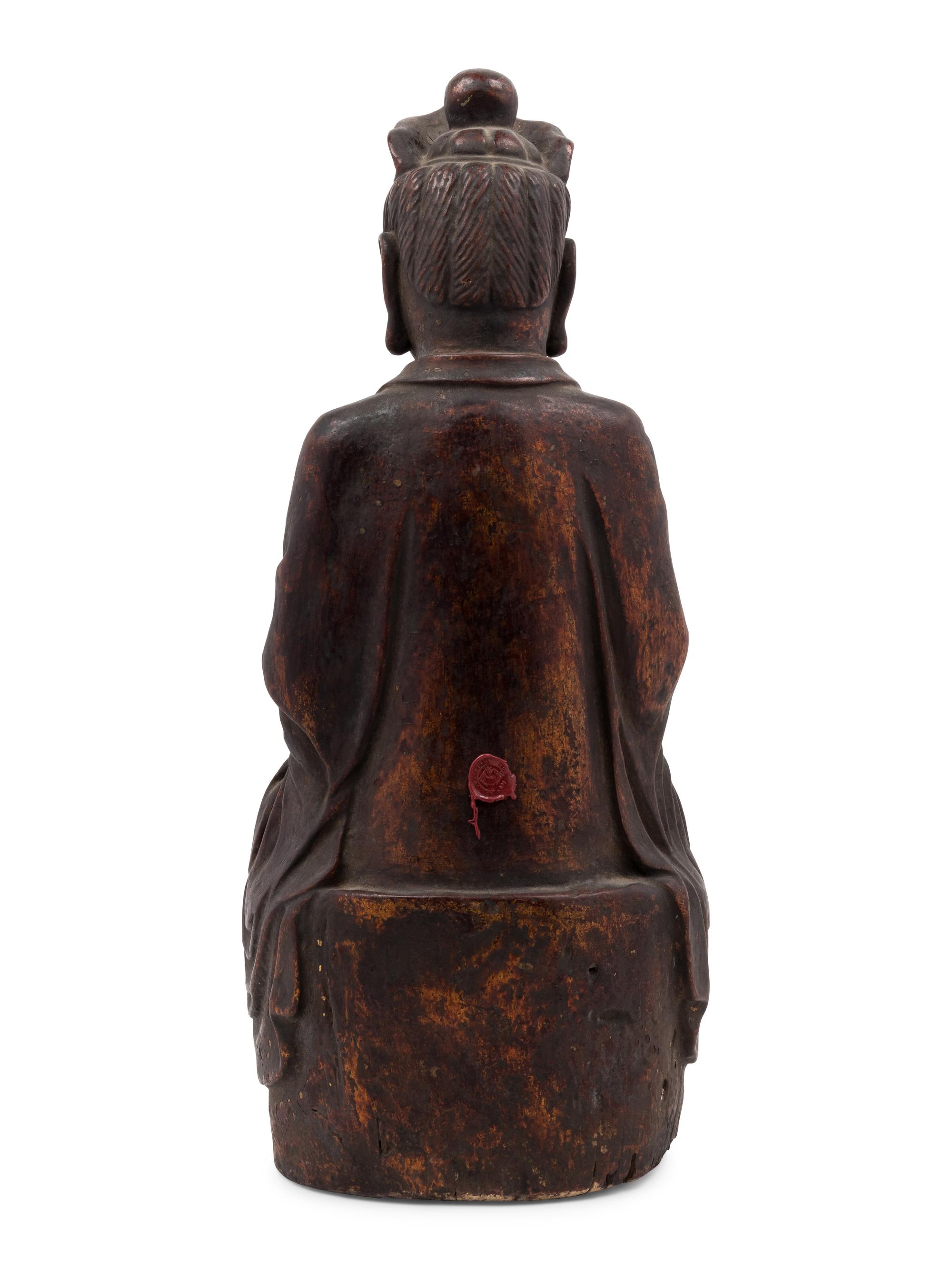 A Chinese Carved Wood Seated Buddha Figure