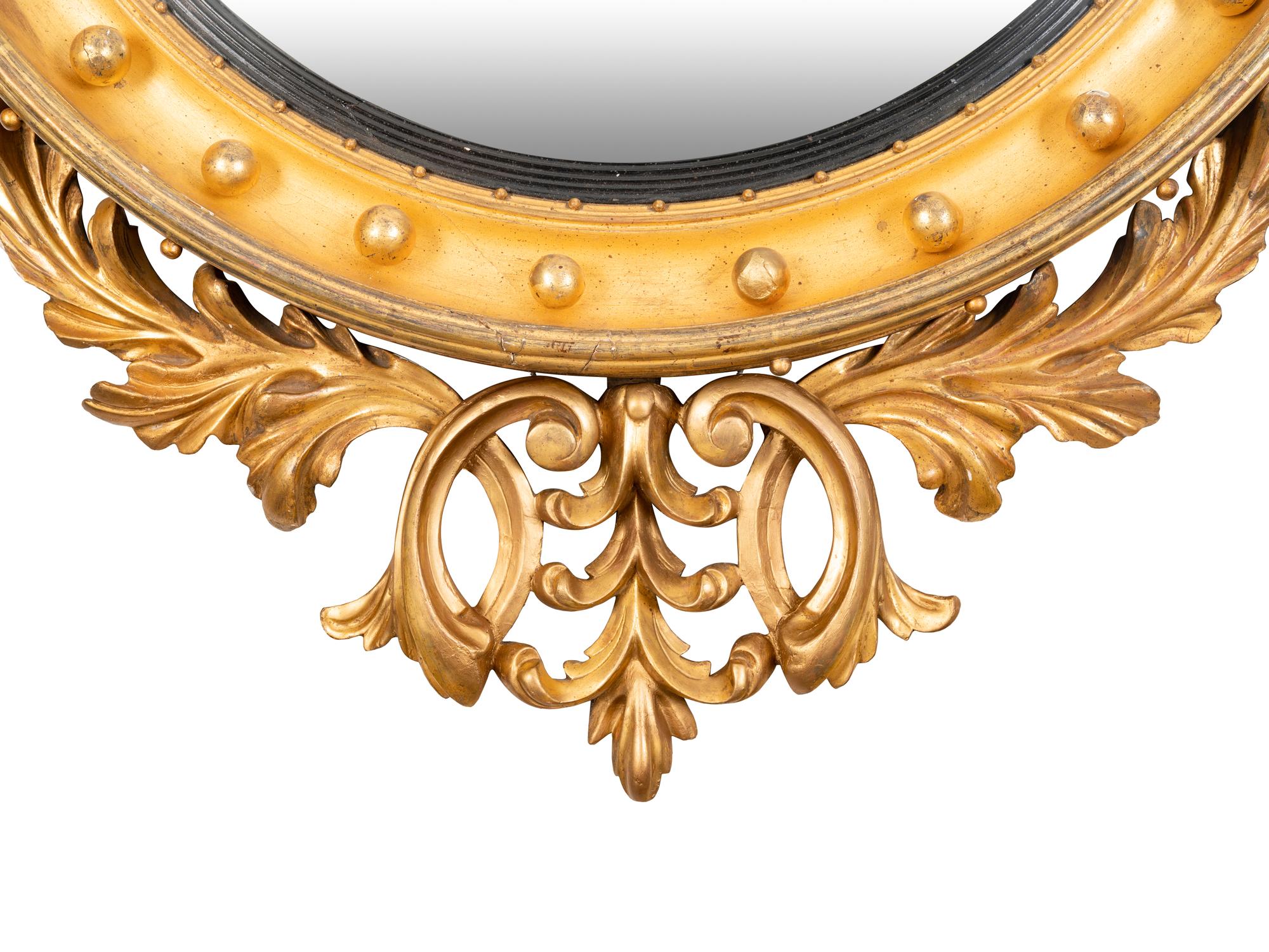 A Regency Giltwood Convex Mirror