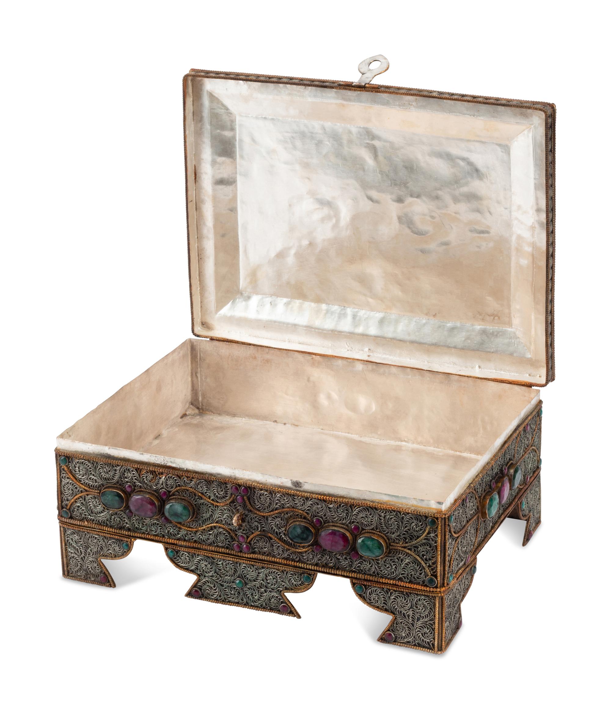 A Silvered Metal Filigree, Ruby and Emerald Table Casket