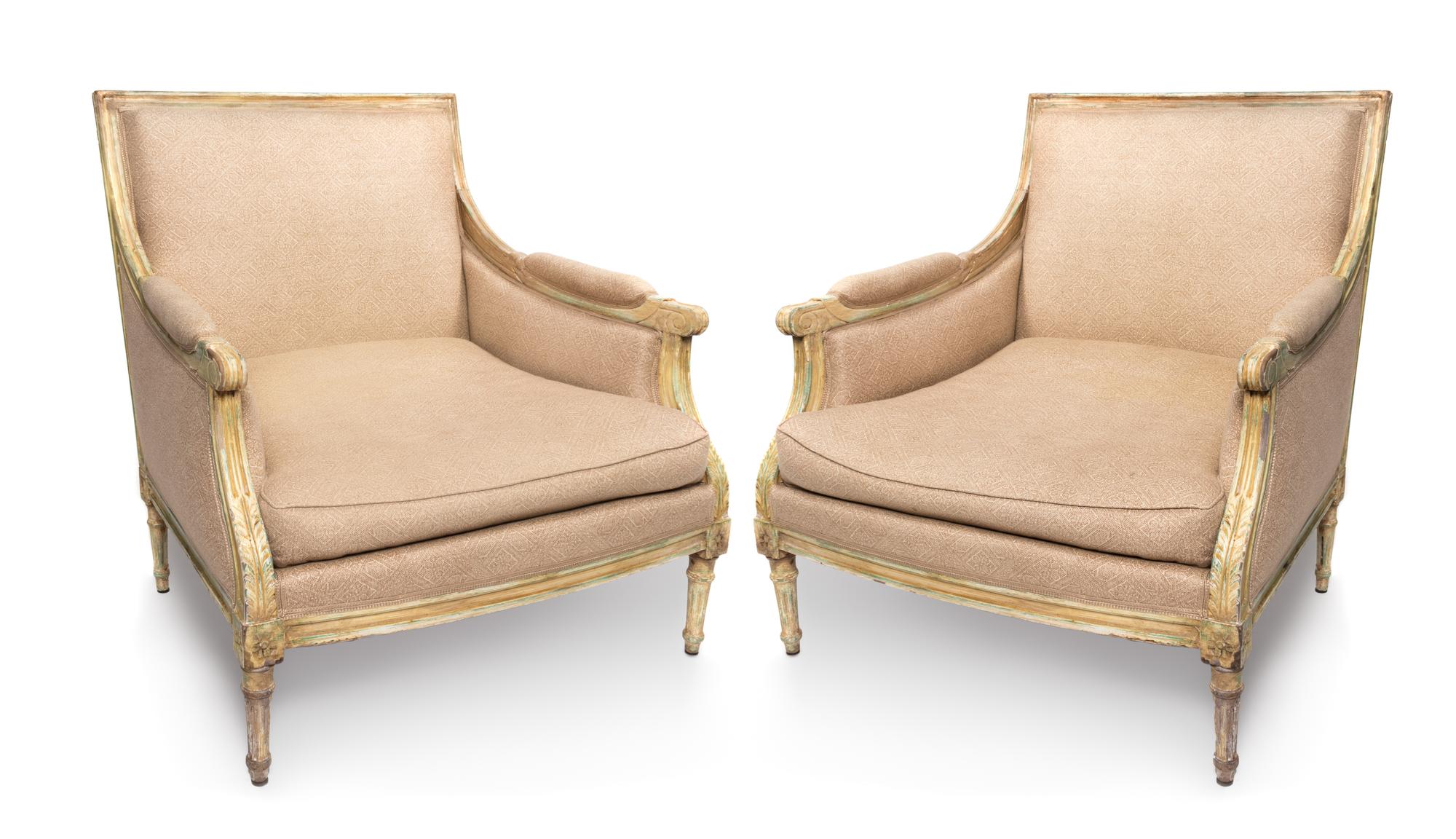 A Pair of Louis XVI Style Carved and Painted Bergeres — 20TH CENTURY