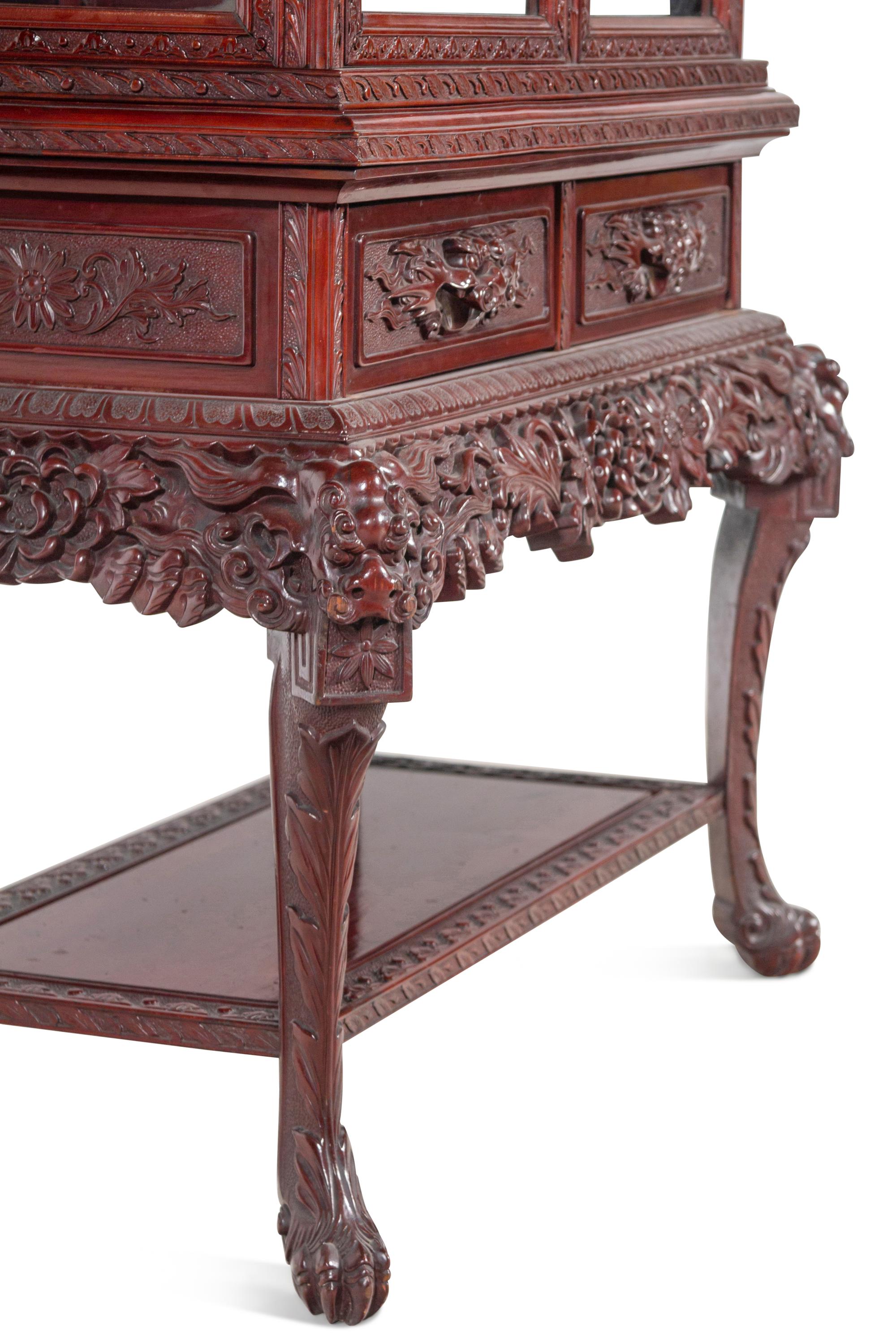 A Japanese Export Carved Hardwood Displaying Cabinet