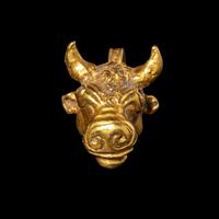 A Roman Gold Bull Pendant