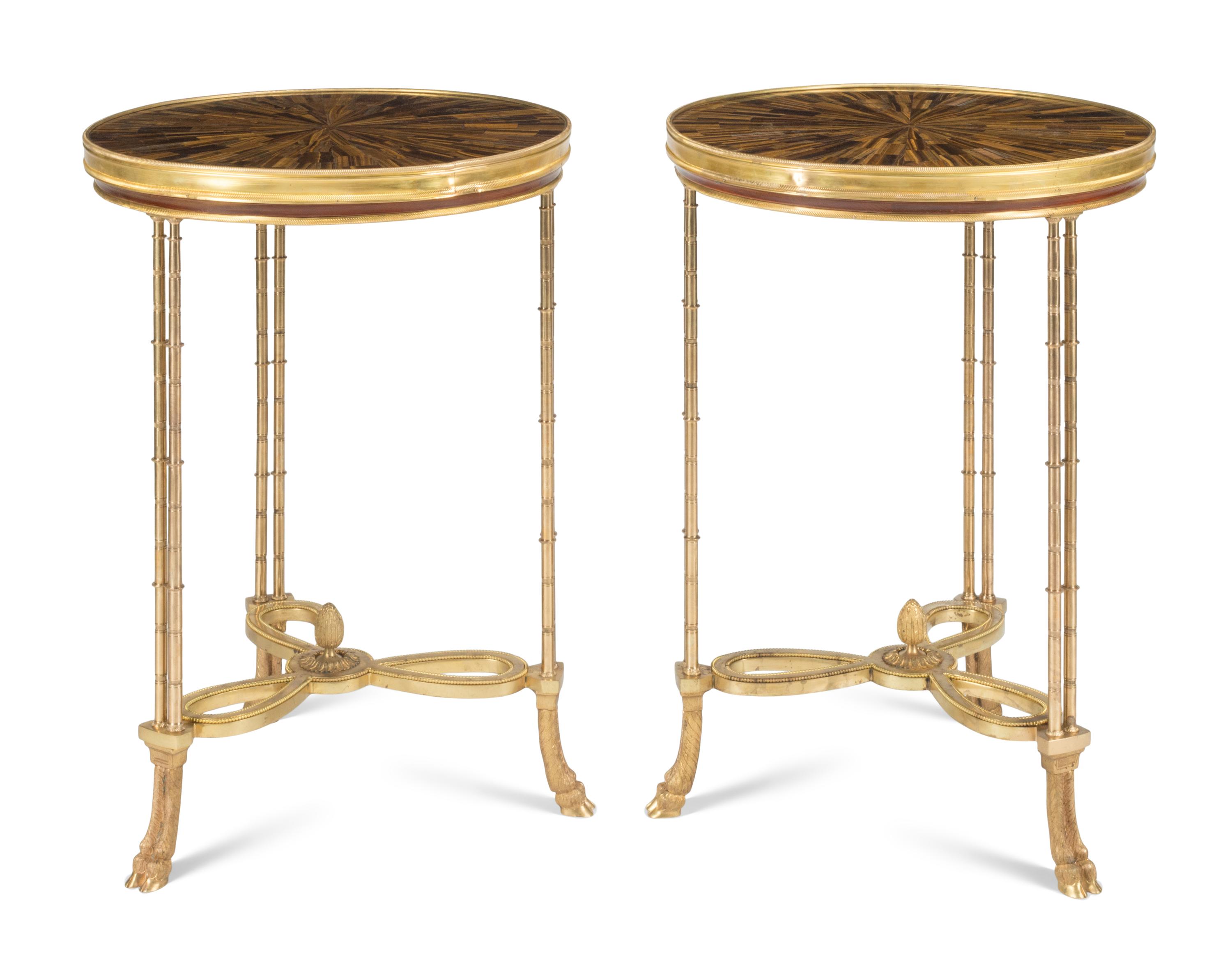 A Pair of French Neoclassical Style Gilt Bronze and Tiger's Eye Guéridons