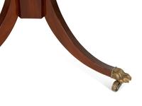 A Regency Style Mahogany Center Table with Inset Brown Leather Top — 20th Century