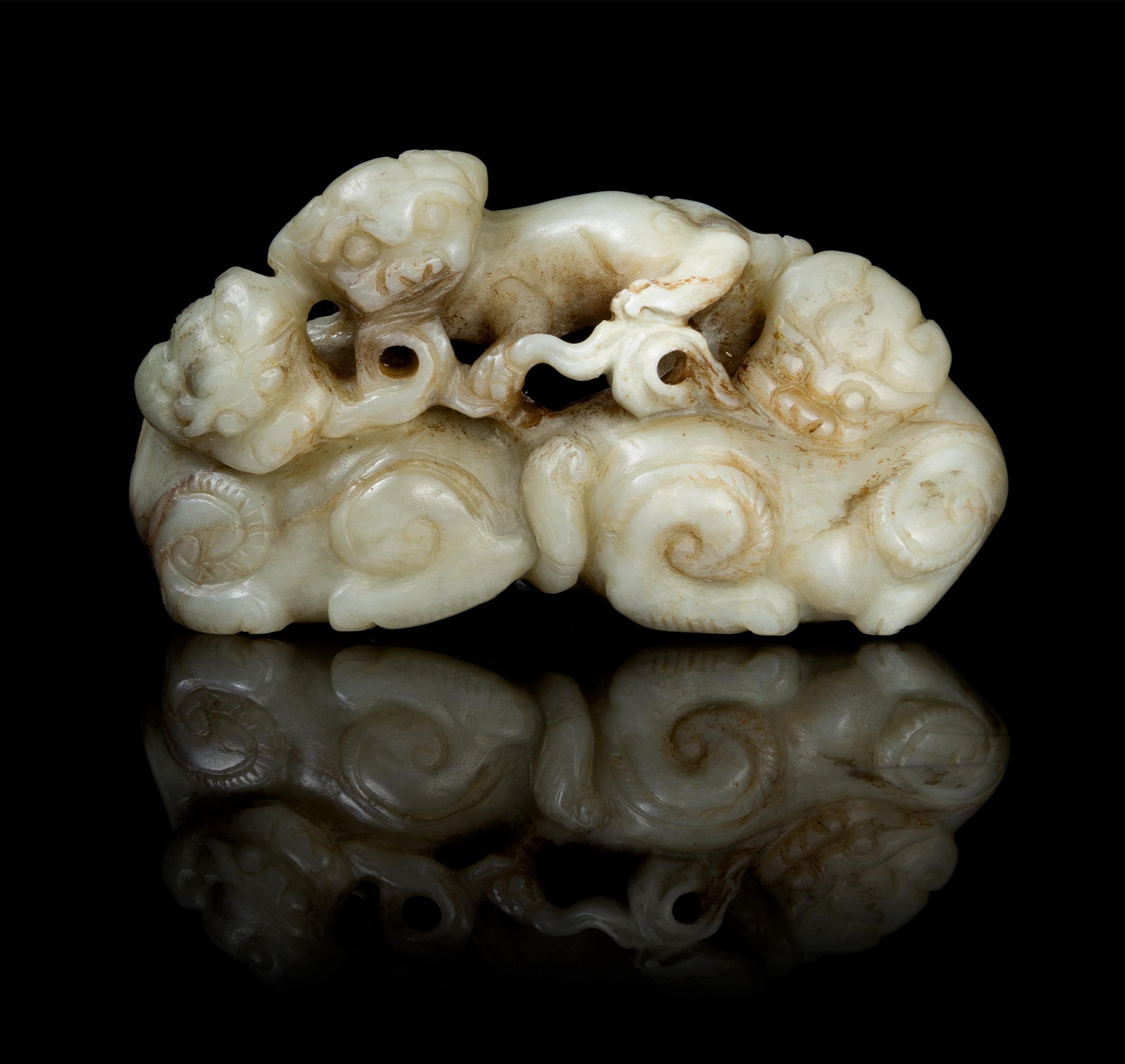 A Carved Jade Figural Group Length 3 1/2 inches.