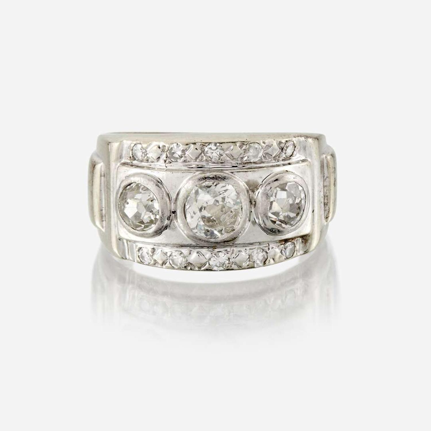 A diamond and fourteen karat gold ring