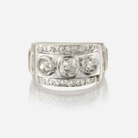 A diamond and fourteen karat gold ring