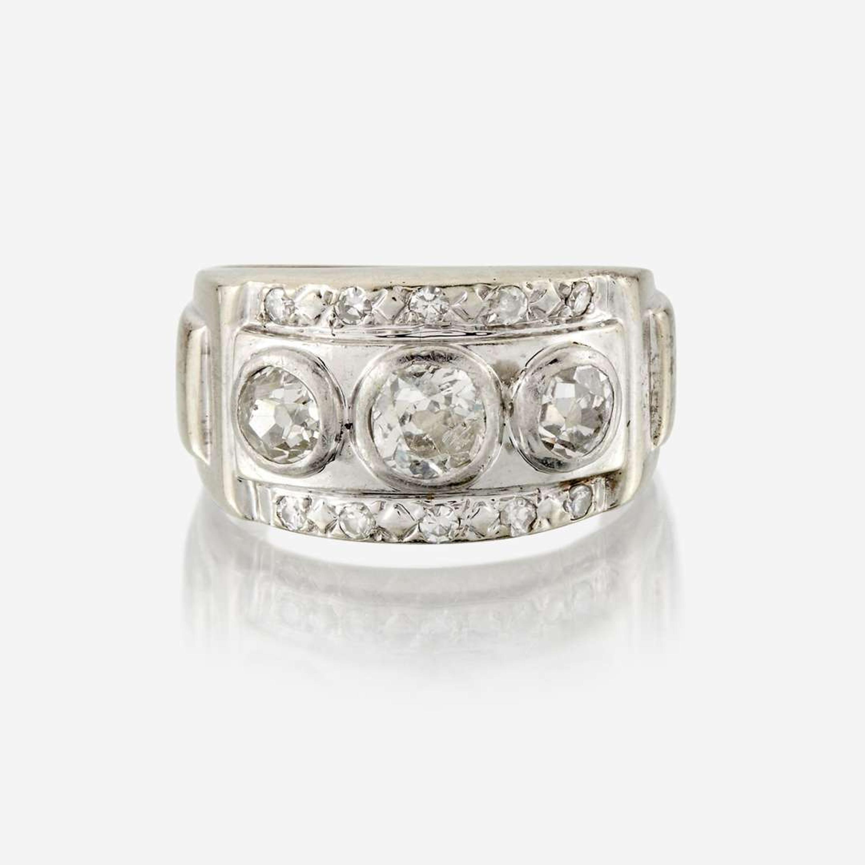A diamond and fourteen karat gold ring