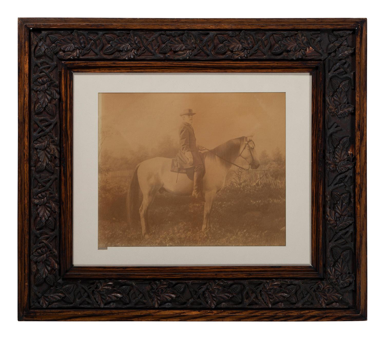 LEE, Robert E. (1807-1870). Oversize albumen photograph of Lee astride Traveller. [Lexington, VA]: Michael Miley, [September 1866].
