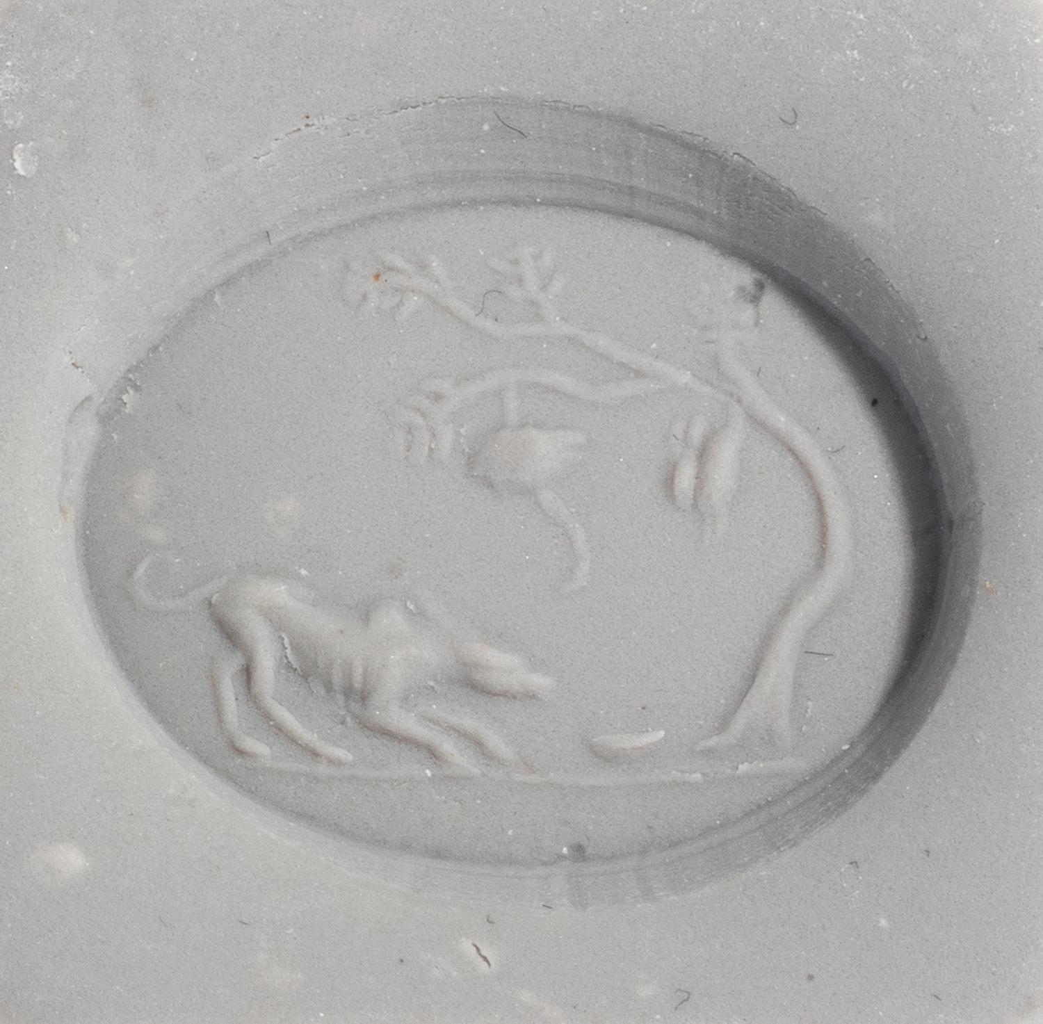 Two Roman Bloodstone and Carnelian Ringstones with Dogs