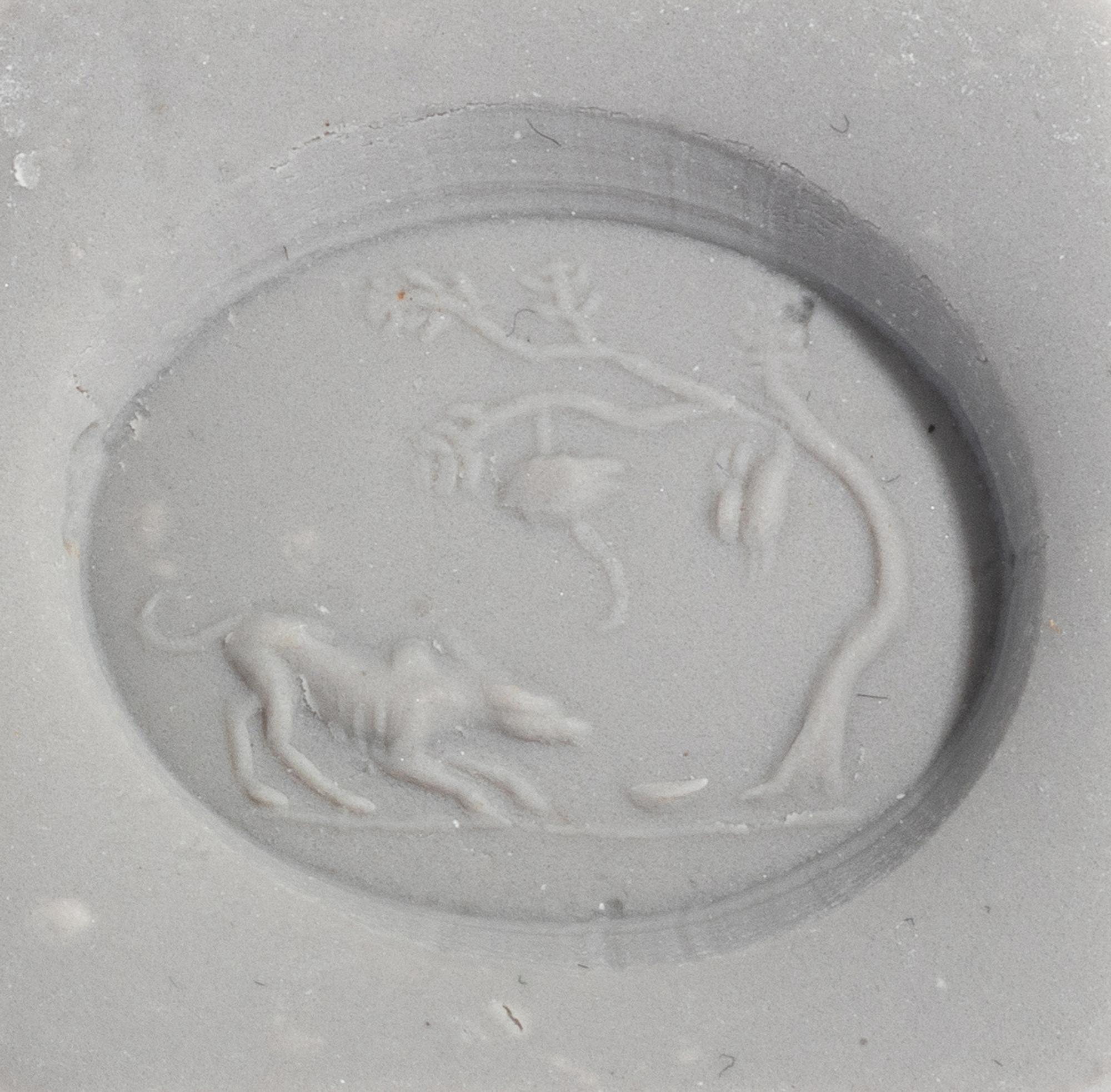 Two Roman Bloodstone and Carnelian Ringstones with Dogs