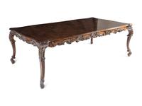 A George II Style Carved Walnut Dining Table